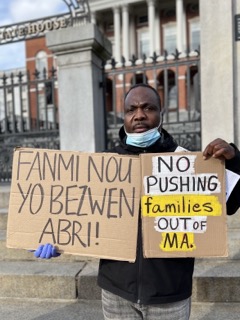 photo of protest in front of State House